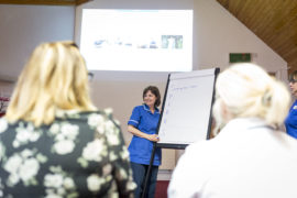 Nurse leading a training session