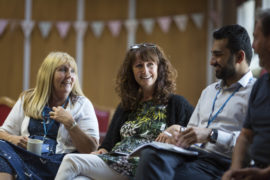 Staff members talking to each other