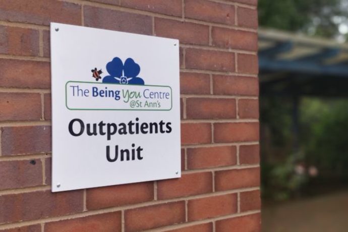 A new sign with the Being You Centre logo and reads Outpatients Unit
