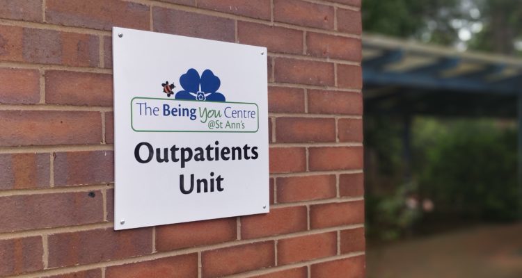 A new sign with the Being You Centre logo and reads Outpatients Unit